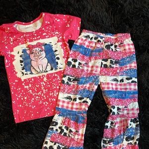 Pink pig shirt and bell bottoms